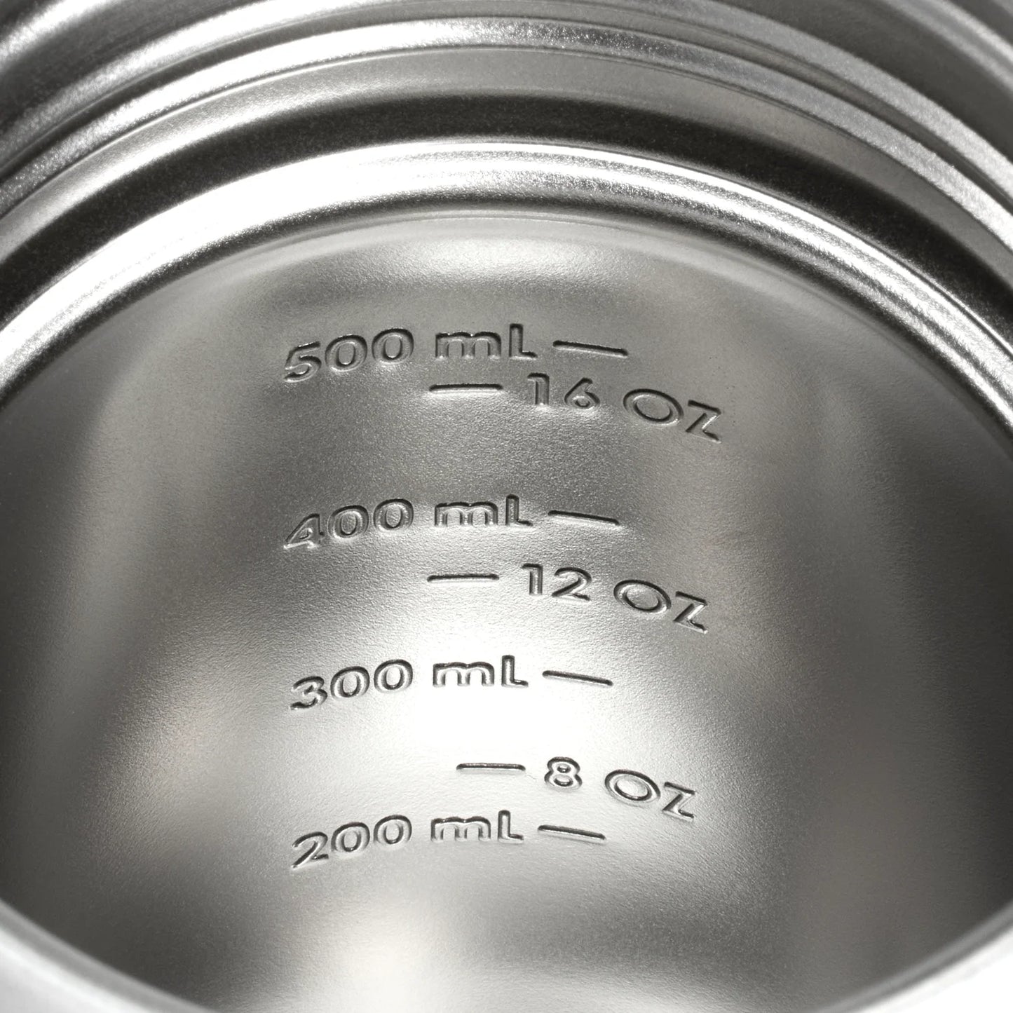 Close-up of the stamped measurement markings inside the Stanley Activate Shaker Bottle, displaying ounces and milliliters.