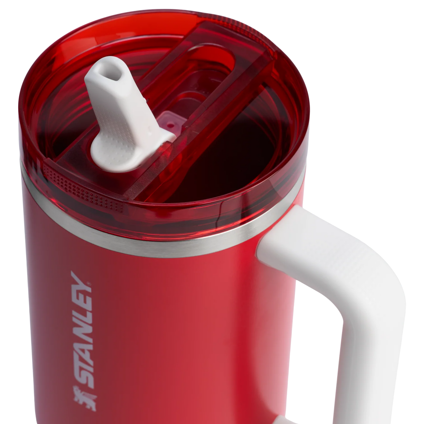  Close-up of the white Arsenal cannon logo on the Stanley Quencher red tumbler, detailing the wheel and cannon design.