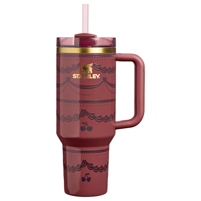 Stanley Quencher H2.0 FlowState 40oz tumbler in Red Velvet Cake color with handle and straw, featuring deep red finish with heart and cherry pattern.